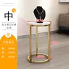 Mesa de joyería de lujo ligero mesa redonda pequeña bolsa para zapatos mesa de correr alta y baja estante de exhibición de joyería estante de almacenamiento redondo de hierro