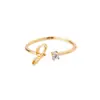 Anel de letra AliExpress 26 letras AZ banhado a ouro 18K anel neutro anel de dedo criativo joias por atacado
