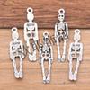 Colgante de calavera para Halloween, accesorios de aleación de zinc para manualidades, de plata antigua, 8 x 38 mm, para pulsera y collar