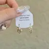 Pendientes y Hebillas de Oreja Dorados Trenzados para Mujer 2025 Nuevos Populares de Nicho Únicos Joyería de Oreja de Lujo Accesible de Gama Alta Atmosférica