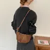 Bolsa pequeña bolsa para ir al trabajo modelo nuevo teléfono móvil cuerno nicho retro para mujer de un solo hombro cruzada de moda otoño e invierno lunares 2026