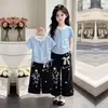 2026 Conjunto de Dos Piezas para Niñas: Top Casual de Manga Corta con Cordón Elegante y Único, Pantalones Largos de Encaje con Lazo para Verano