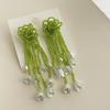Pendientes de botón de flores estilo festivo francés Super Fairy Pendientes de borlas de cuentas hechos a mano Pendientes delgados de cara elegante Sentido avanzado