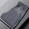 Pantalones de Malla Transpirable de Seda Helada Nuevos de Verano para Hombre Pantalones Elásticos de Secado Rápido para Hombre Talla Grande Casual de Nueve Puntos Pantalones de Aire Acondicionado para Hombre