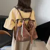 Bolso vintage de gran capacidad para mujer, nuevo modelo otoño e invierno 2026, mochila súper popular para el día a día, bolso de hombro moderno y versátil de múltiples usos