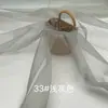 Tela de Organza 2020D Hilo Ruyi Mate Transparente Ligeramente Rígida Accesorios de Encaje Bordado Tela para Empaque de Regalos