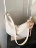 Bolsa de Dumpling Popular de Verano para Mujer 2025 Nueva Versátil Casual Bolso de Hombro Simple Color Puro Bolso Cruzado de Alta Gama