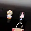 Estilo coreano súper~ Nuevo gancho para coche de pingüino, gancho para guantera para el asiento del copiloto, gancho de almacenamiento para la primera fila del coche, un toque de encanto