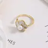 Anillo de Flor de Concha Giratoria Perla de Agua Dulce Natural Incrustado con Nácar Cobre Chapado en Oro Color Duradero Anillo de Temperamento Venta al por Mayor