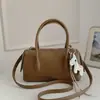 Bolsa Boston de Bowling de Nicho Feminina 2026 Primavera Nova Bolsa de Mão Bolsa Baguete de Grande Capacidade para Ombro