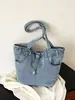 Bolso de axila de diseño retro de nicho transfronterizo para mujer, bolso de mano de lona simple y elegante, bolso de hombro casual y único para el día a día
