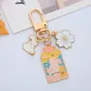 Estilo Japonés Ins Flor de Cerezo Flor de Durazno Protector para Atraer Riqueza y Suerte Llavero Creativo para Pareja Colgante para Bolso de Pareja para Mujeres