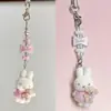 Cadena de Teléfono de Conejo Miffy Flocado Lindo Colgante Dulce Encanto Pequeño Flocado Regalo para Mejor Amiga Lindo Artículo Pequeño