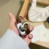 CorreaAplicable a la correa del iwatch Apple S12 de cuero vintage con hebilla C, correa de muñeca de moda de lujo ligero para mujer
