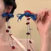 Pendientes Rojos Pendientes de Borla con Cuentas 2025 Nuevo Estilo Popular Lujo Accesible Pendientes Elegantes Atmosféricos de Gama Alta Otoño e Invierno