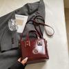 Comercio exterior Bolsa roja Ankora para mujer otoño e invierno 2024 nueva bandolera versátil popular este año bolso cubo portátil