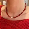 Collar Shijia Pearl de ágata rojo natural Regalo de Año Nuevo collar rojo temperamento de nicho cadena para la clavícula cadena para suéter para mujer