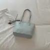 Bolsa Tote Shuai Mi Jia 2026 Nuevo Estilo Coreano Moda Bolso de Hombro Simple Moderno Elegante para el Trabajo