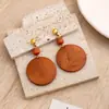 Pendientes de Madera Geométricos Transfronterizos Europeos y Americanos para Mujer, Pendientes de Madera Redondos con Diseño Hueco Exagerado Simple Retro Venta al por Mayor