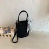 Bolso de mano muy elegante 2026 primavera nuevo nicho bandolera para el trabajo estilo dulce francés bolso de hombro para salir
