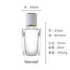 Venta directa en stock botella de perfume de vidrio transparente de 50 ml con cuello de 15 mm, botella vacía de alta gama, botella rellenable, botella con atomizador