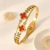 Pulsera de trébol de cuatro hojas retro de celebridad de internet, no se decolora, tacto de alta gama, diseño de nicho, decoración exquisita de esmalte coloreado de nácar, accesorio para la mano