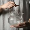Tetera de vidrio resistente al calor con patrón de pétalos de crisantemo estilo japonés, tetera de flores, tetera para preparar té en estufa eléctrica de cerámica, tetera kung fu