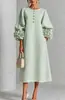 Vestido de moda europeia e americana para mulheres 2026, gola redonda, com mangas tipo lanterna floral tridimensionais, tecido texturizado, caimento solto, elegante, comprimento médio, corte reto