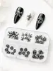 Acessórios de Liga de Metal para Unhas com Tema Caveira e Cruz 6 Peças Transfronteiriços Halloween Tema Escuro Caixa com Acessórios de Unha Vestíveis DIY Atacado