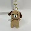 Llavero Colgante Perro Marrón Tejido a Crochet Muñeca Linda Adorno para Bolsa Regalo Venta al por Mayor