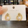 Brincos de pérolas de cobra de zircônia da moda coreana, brincos de pino de prata de celebridades da Internet elegantes e sofisticados para mulheres, brincos de nicho para todos os gostos