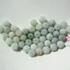 Cuentas de jade de Myanmar flor de loto cuentas sueltas venta al por mayor cuentas redondas verde blanco flor de loto sueltas accesorios DIY pulsera collar