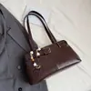 Bolso de hombro retro de alta gama para mujer, estilo otoño/invierno 2025, con textura, ideal para el día a día.