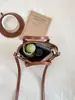 Bolsa pequena de mão color-blocking de alta qualidade para mulheres, nova 2025, versátil, estilosa, bolsa tipo balde transversal, bolsa de ombro única fashion