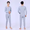 Directo de fábrica hombres color liso estampado lana más terciopelo acolchado ropa interior térmica cuello redondo conjunto de pantalones de otoño Venta al por mayor