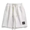 Shorts de Verão Masculino 2026 Novo Primavera Estampa de Letras Shorts de Comprimento Médio Versátil Shorts de Cinco Pontos Calças Casuais Respiráveis de Quatro Pontos