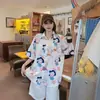 Camisa de Manga Corta de Dibujos Animados de Diseñador de Nicho Verano 2026 Estampado de Niña Camisa de Playa Estilo Hong Kong Top Holgado