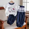 Conjunto de verano para bebé niña de gato KT de manga corta, nuevo estilo 2026, falda anti-mosquitos con pantalón de lunares, conjunto de dos piezas para niños, moderno