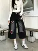 Pantalones de Mezclilla Anchos Negros Bordados Hechos a Medida de Fábrica para Mujer, Nuevo Estilo de Verano, de Tiro Alto, que Cubren la Cadera, Pantalones Cropped Adelgazantes de Trabajo