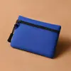 Bolsa para monedas impermeable de tela Oxford simple en stock para hombres y mujeres, tarjetero ultraligero, llavero, minibolso portátil