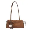 Bolso retro de axila estilo coreano para mujer, nueva colección otoño 2026, bolso de hombro simple, elegante y adecuado para el trabajo y los desplazamientos