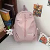 Mochila transfronteriza para mujer, estilo coreano, de alta gama, nicho, simple, resistente al agua, adecuada para estudiantes de primaria, viajes al aire libre y desplazamientos