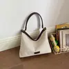 2026 Bolsas Nuevas de Lona para Mujer Nueva Elegante Bolso de Hombro Cruzado con Temperamento Versión Coreana Moda al por Mayor Bolso Cuadrado Pequeño