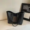 Bolso tote de gran capacidad estilo coreano, nuevo modelo principios de otoño 2026, bolso de hombro casual simple para el trabajo y los desplazamientos