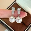 Pendientes de Perla Elegantes de Gama Alta para Mujer Diseño de Nicho Moda Accesible Lujo Pendientes de Diamante Nuevos Pendientes 2025