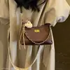 Bolso de hombro retro de terciopelo para mujer, nuevo, moderno, gran capacidad, otoño, bajo el brazo, gamuza, exquisito, de mano, simple, cruzado, 2026