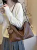 Bolsa de ombro vintage transfronteiriça para mulheres, nova bolsa de axila de nicho de alto valor, bolsa versátil de ombro e transversal atacado