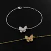 [08] Joyería de diamantes estilo Oriente Medio suministro exquisito cobre micro incrustación chapado en oro mariposa completa pulsera de diamantes dos colores