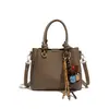 Bolsa Saco Yuezi Simples e Versátil 2026 Novo Modelo para Mulheres, Bolsa de Ombro e Transversal de Alto Padrão, Bolsa Moderna para o Dia a Dia