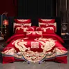 Conjunto de cuatro piezas para boda de algodón de fibra larga de Xinjiang de los años 120, edredón bordado de alta gama para la industria pesada, funda de edredón de algodón rojo